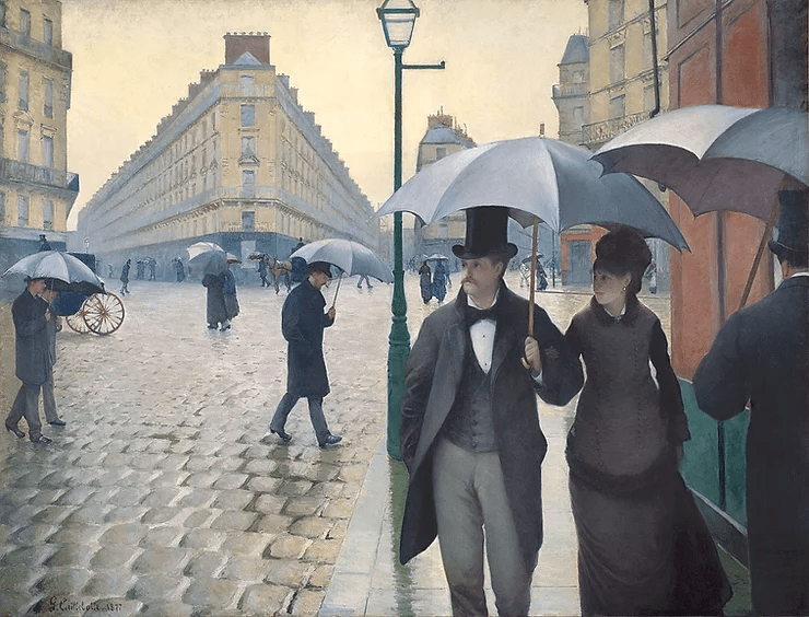 a painting of people in nineteenth-century clothing with umbrellas in the streets of Paris; at right a man is cut off from view