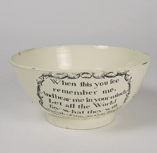 a white bowl with an inscription on it in black reading 'when this you see / remember me / and bear me in your mind, / let all the world / say what they will / speak of me as you find'